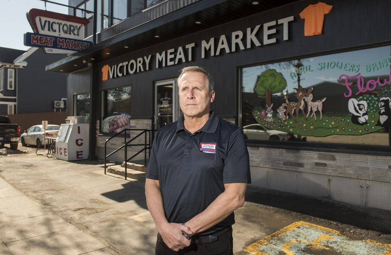 Alex Scholten, co-owner of the Victory Meat & Produce Market Ltd., is shown at his store in Fredericton, Monday, April 10, 2023. For 81 years, the independent store has offered quality products at affordable prices, earning it a loyal customer base despite the increasing dominance of grocery stores chains. THE CANADIAN PRESS/Stephen MacGillivray