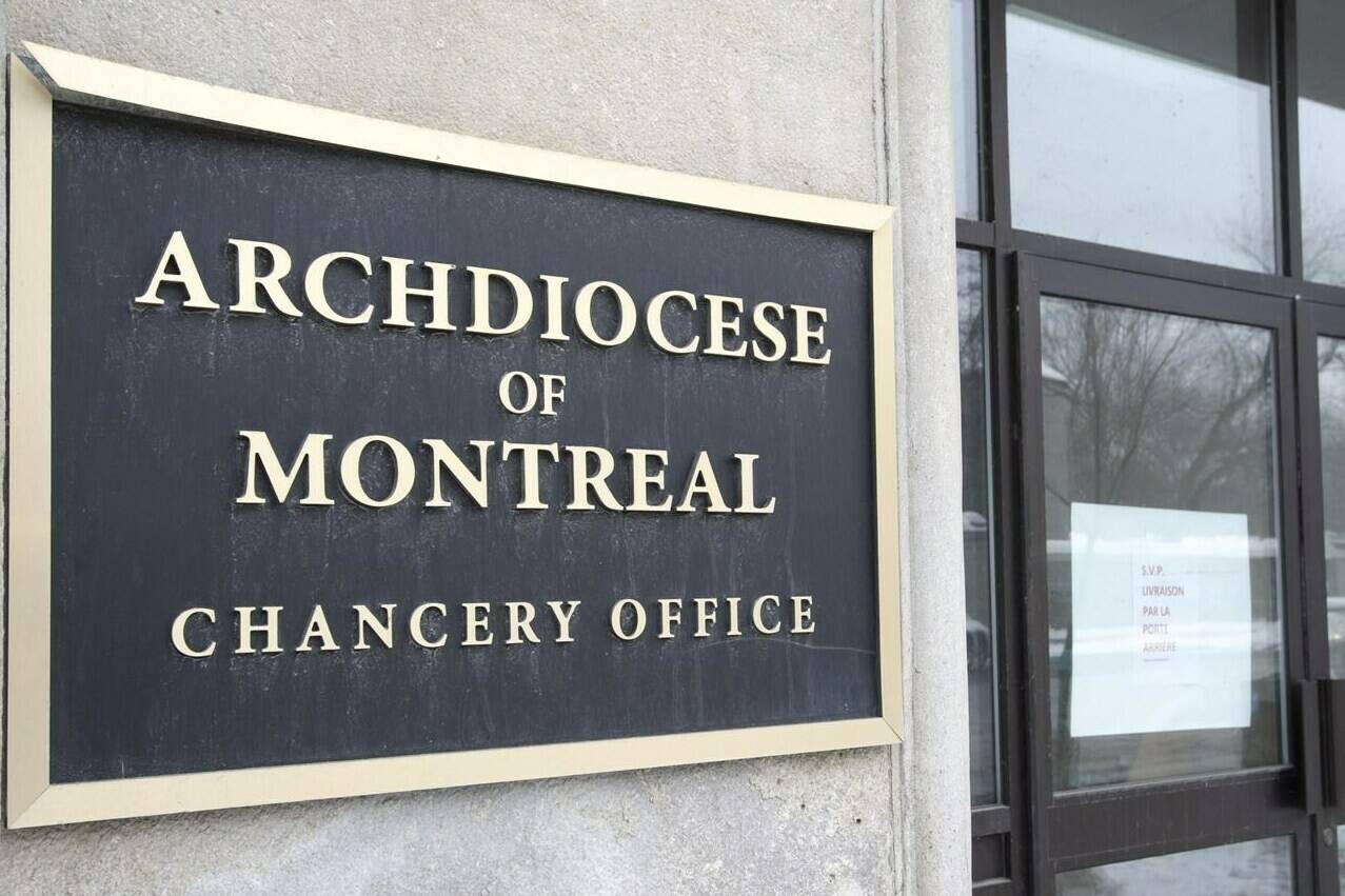 The office of the Archdiocese of Montreal is seen Monday, Feb. 15, 2021, in Montreal. A Montreal law firm says it has reached a $14.7-million settlement in a class-action lawsuit filed against the Montreal diocese in 2019. THE CANADIAN PRESS/Ryan Remiorz