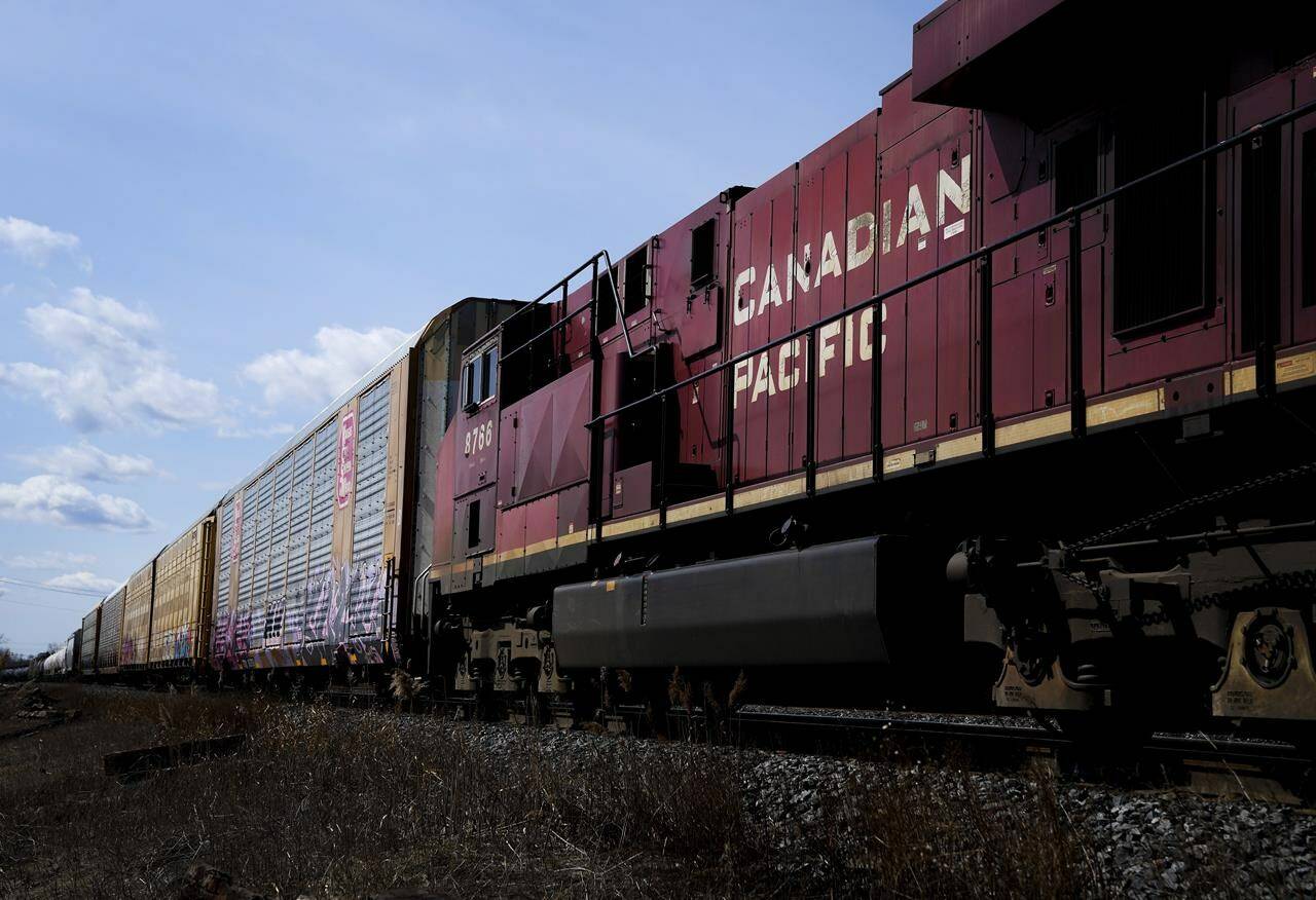 Canadian Pacific Railway trains sit at the main CP Rail trainyard in Toronto on Monday, March 21, 2022. Canadian Pacific Railway Ltd. and Kansas City Southern have officially combined to create Canadian Pacific Kansas City. THE CANADIAN PRESS/Nathan Denette