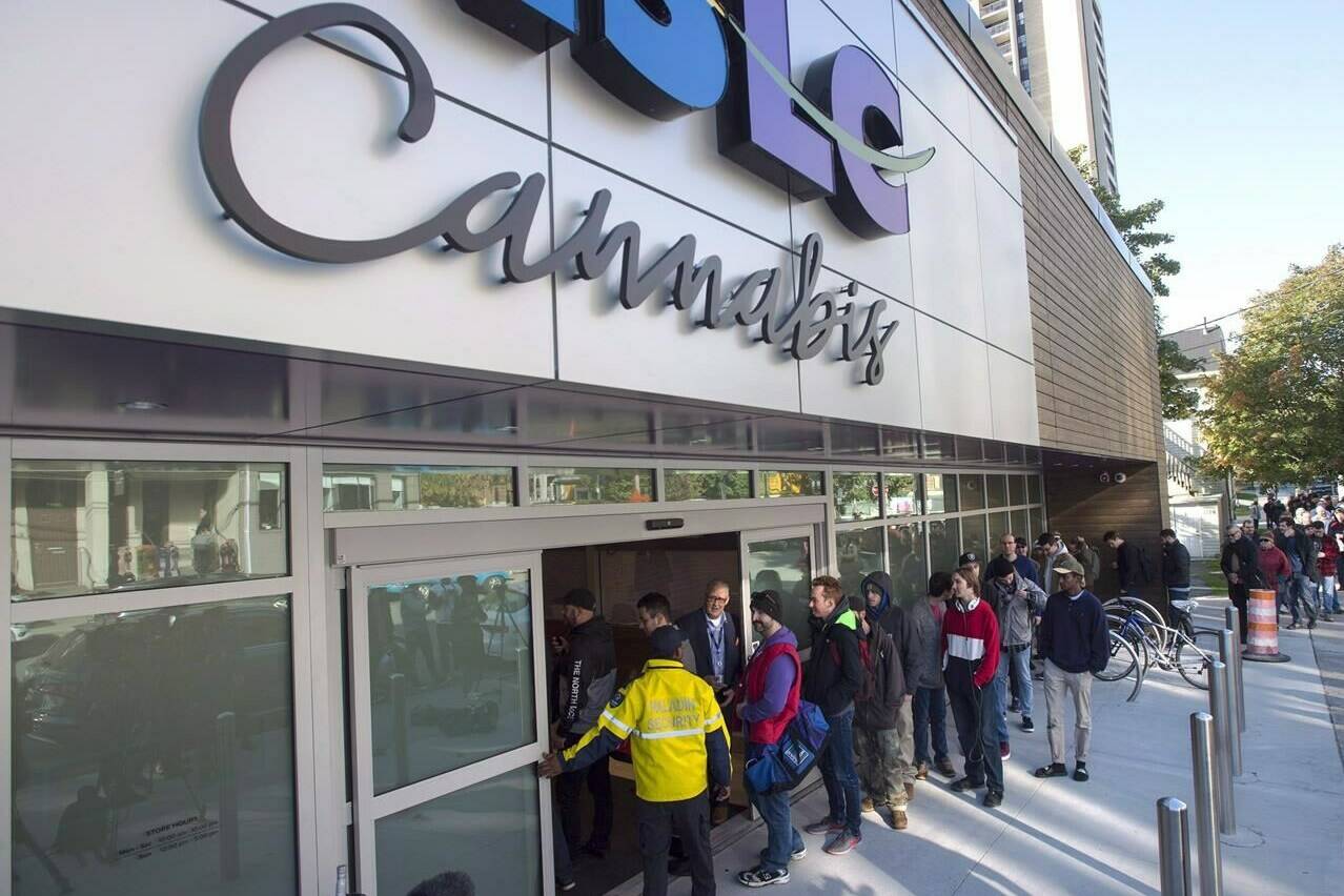 Customers enter the Nova Scotia Liquor Corporation cannabis store in Halifax on Oct. 17, 2018. A spate of cannabis store robberies has many in the industry calling for provinces to relax regulations requiring window coverings or cannabis to be kept out of sight of minors. THE CANADIAN PRESS/Andrew Vaughan