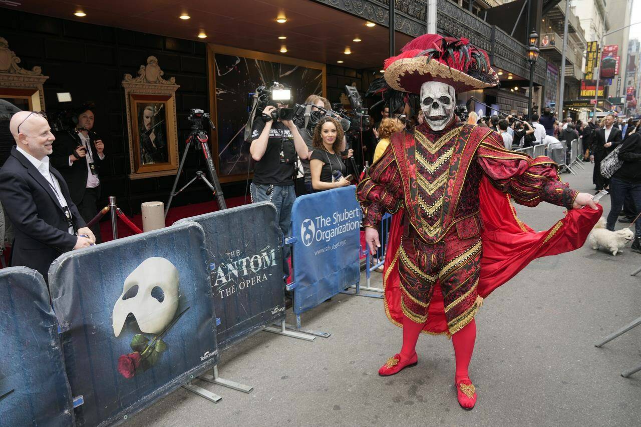 A costumed ticket holder attends “The Phantom of the Opera,” final Broadway performance at the Majestic Theatre on Sunday, April 16, 2023, in New York. (Photo by Charles Sykes/Invision/AP)