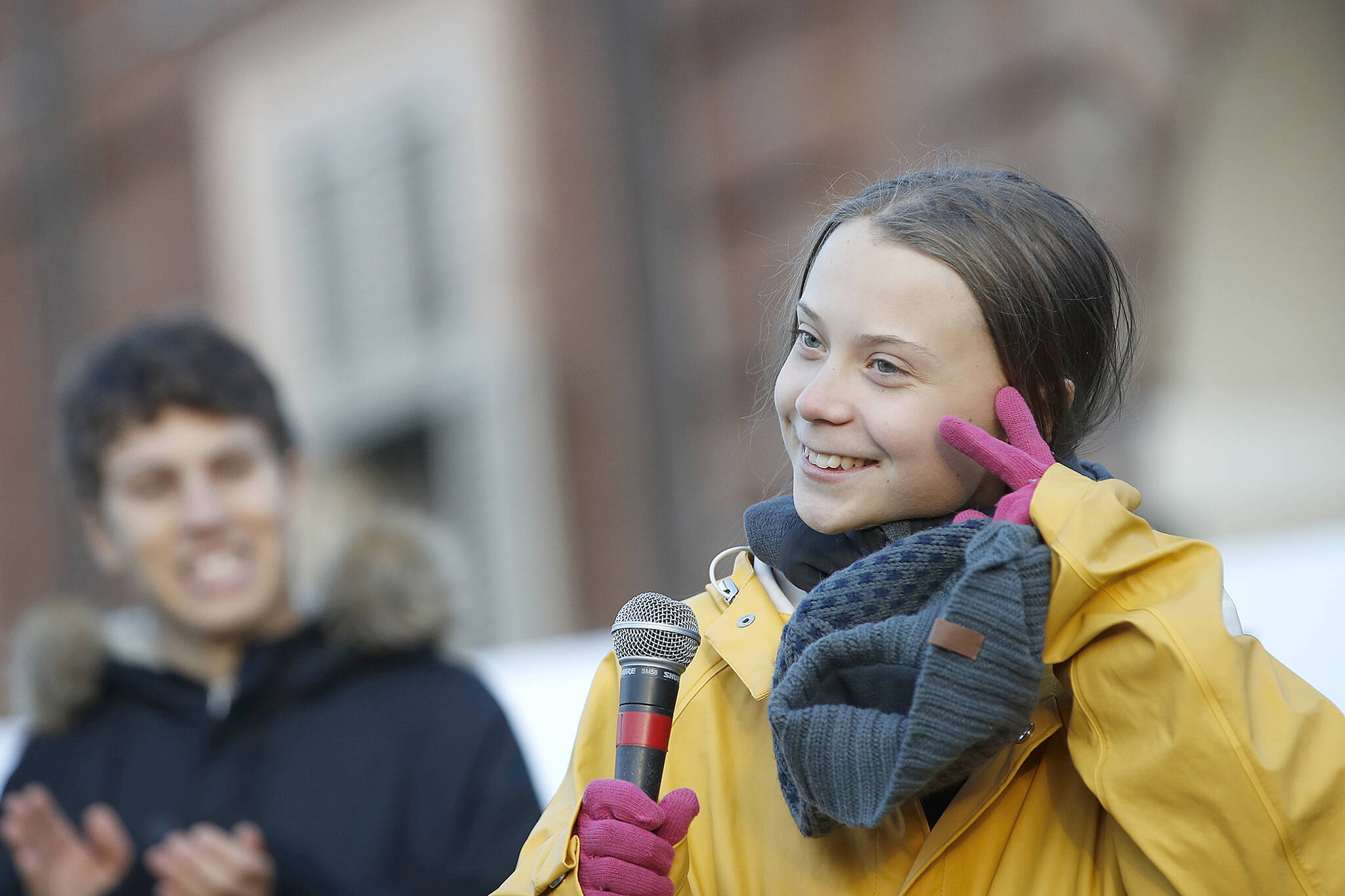 Swedish environmental activist Greta Thunberg attends a climate march, in Turin, Italy, Friday. Dec. 13, 2019. In which year was she born? (AP Photo/Antonio Calanni)