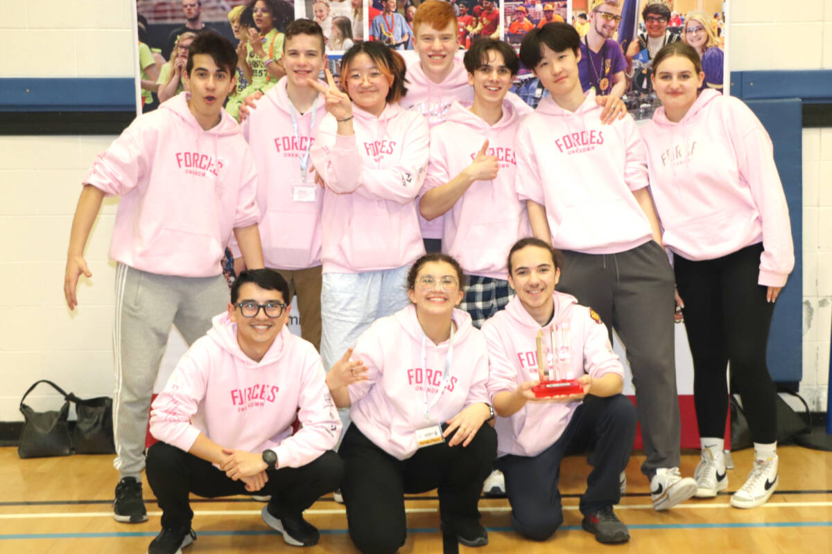 The Forces Unknown team, including Langley’s Jacob and Noah St. Jean in the back row, are heading to Texas this week to compete in a world robotic championship. (Special to Langley Advance Times)