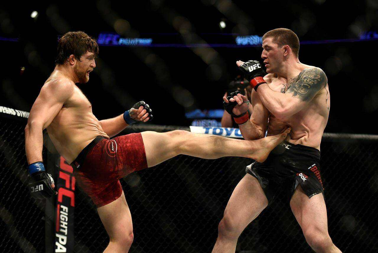 Andrew Sanchez, left, kicks Marc-Andre Barriault as they fight in the middleweight bout during UFC Fight Night in Ottawa on Saturday, May 4, 2019. Six Canadians, including middleweight Barriault have been added to the June 10 UFC 289 card at Vancouver’s Rogers Arena. THE CANADIAN PRESS/Justin Tang