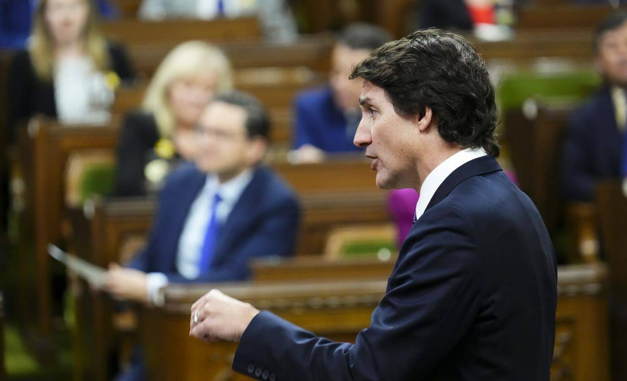 The Liberals have put forward legislation that aims to make good on their pledge to tighten passenger rights rules after a year pocked by travel chaos and a ballooning complaints backlog. Prime Minister Justin Trudeau rises during question period in the House of Commons on Parliament Hill in Ottawa on Tuesday, April 18, 2023. THE CANADIAN PRESS/Sean Kilpatrick