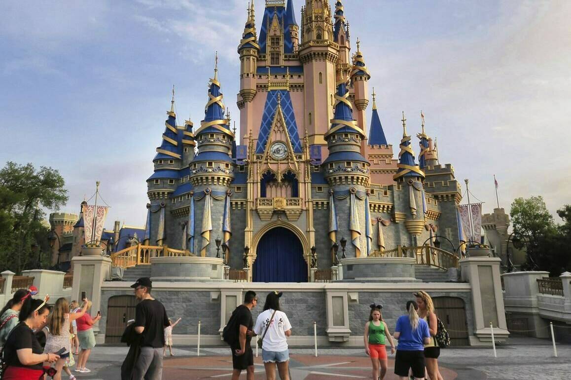 Cinderella Castle stands at the Magic Kingdom, at Walt Disney World, in Lake Buena Vista, Fla., Monday, April 3, 2023. (Joe Burbank/Orlando Sentinel via AP)