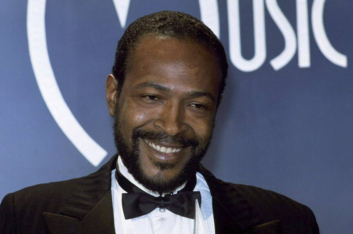 FILE - Singer-songwriter Marvin Gaye, winner of Favorite Soul/R&B Single, “Sexual Healing,” attends the American Music Awards on Jan. 17, 1983, in Los Angeles. Jury selection and opening statements are expected to begin Monday, April 24, 2023, in a trial that mashes up Ed Sheeran’s “Thinking Out Loud” with Marvin Gaye’s “Let’s Get It On.” (AP Photo/Doug Pizac, File)