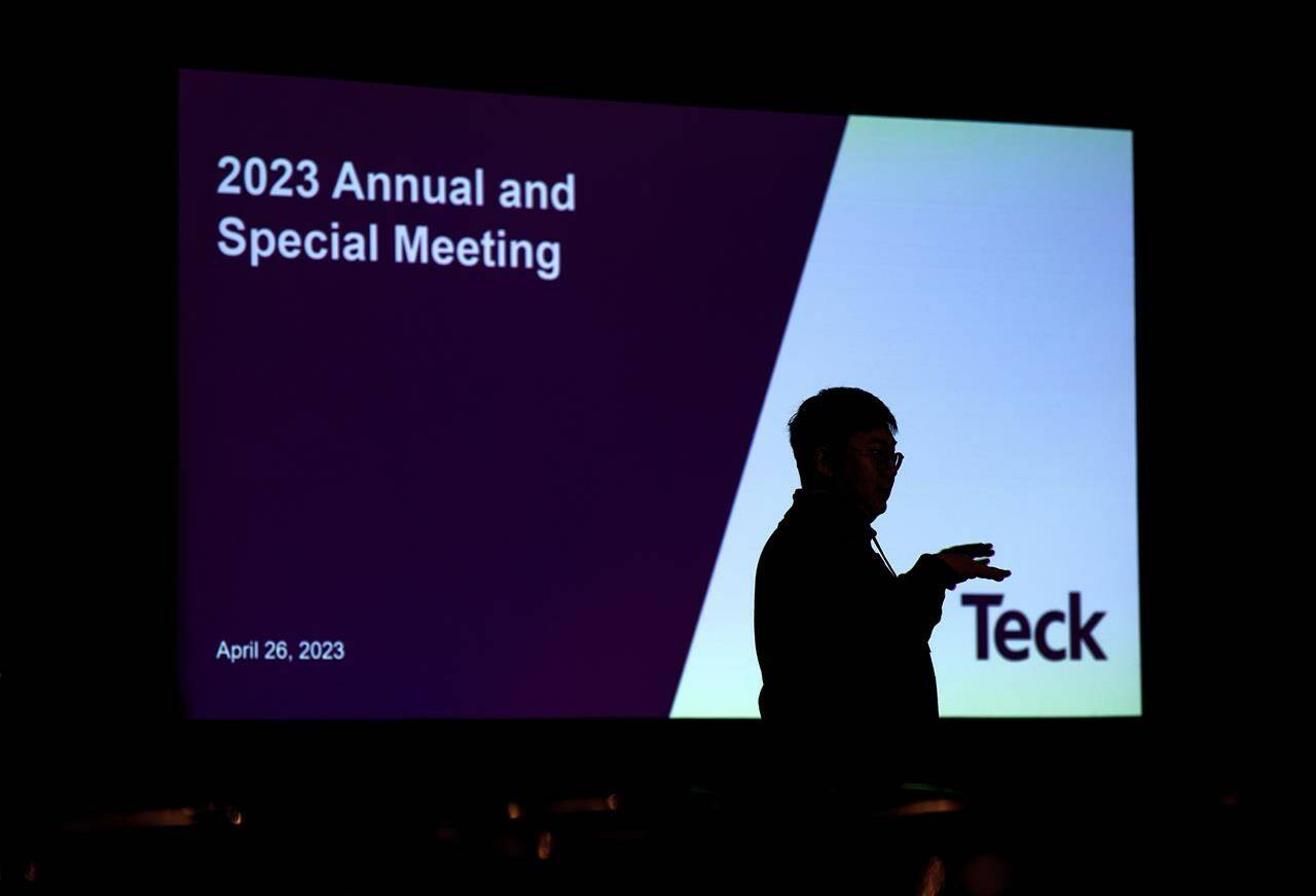 A journalist is silhouetted before the Teck Resources special meeting of shareholders, in Vancouver, B.C., Wednesday, April 26, 2023. THE CANADIAN PRESS/Darryl Dyck