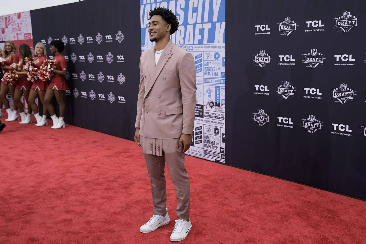 Alabama quarterback Bryce Young arrives on the red carpet before the first round of the NFL football draft, Thursday, April 27, 2023, in Kansas City, Mo. (AP Photo/Charlie Riedel)