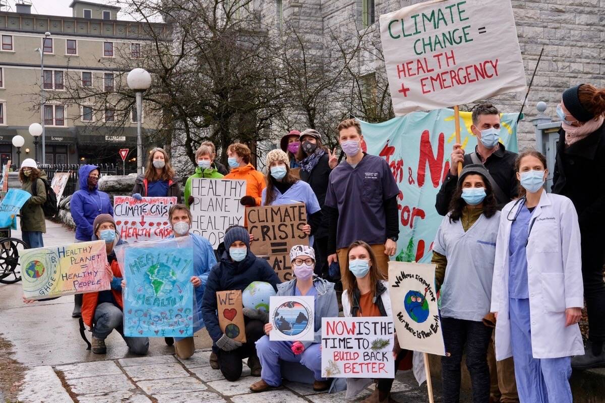 A group of nurses and doctors, all members of the group Doctors and Nurses for Planetary Health, rallied in front of Nelson City Hall in a demonstration to urge governments for action on climate change and environmental degradation. Photo: Bill Metcalfe