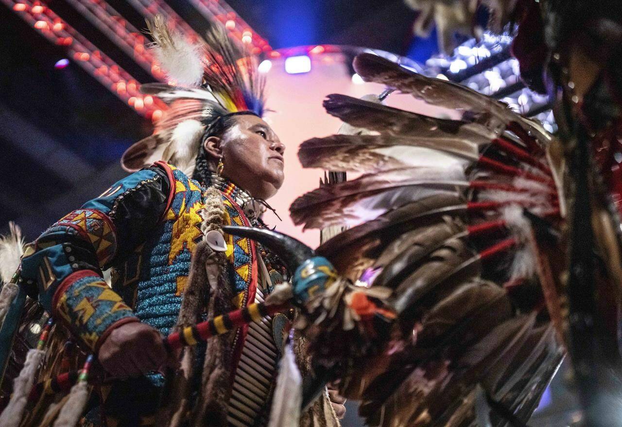 FILE - Dancers participate in the Gathering Of Nations Pow Wow at Tingley Coliseum, Friday, April 29, 2022 in Albuquerque, N.M. Tens of thousands of people are gathering in New Mexico for what organizers bill as the largest powwow in North America. The annual Gathering of Nations kicks off Friday, April 28, 2023, with a colorful procession of Native American and Indigenous dancers from around the world. (Roberto E. Rosales/The Albuquerque Journal via AP, File)