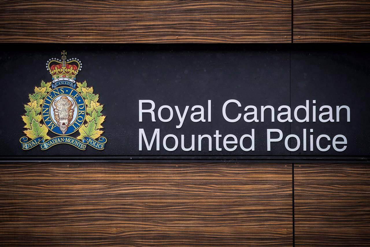 The RCMP logo is seen outside Royal Canadian Mounted Police “E” Division Headquarters, in Surrey, B.C., on Friday April 13, 2018. Residents of a hamlet approximately 80 kilometres west of Edmonton have been ordered to evacuate due to an encroaching grass fire.THE CANADIAN PRESS/Darryl Dyck