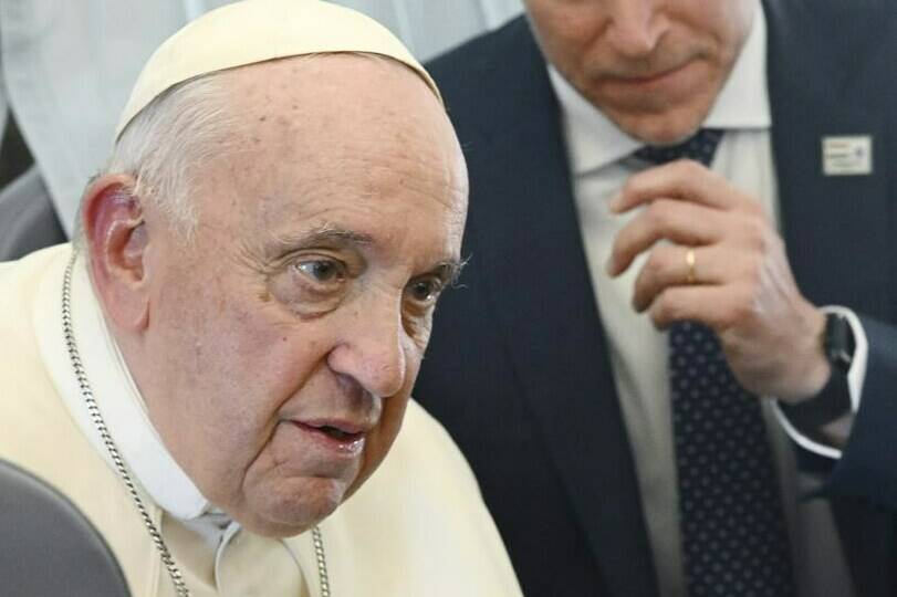 Pope Francis meets the journalists during a press conference aboard the airplane directed to Rome, at the end of his pastoral visit to Hungary, Sunday, April 30, 2023. (Vincenzo Pinto/Pool Photo Via AP)