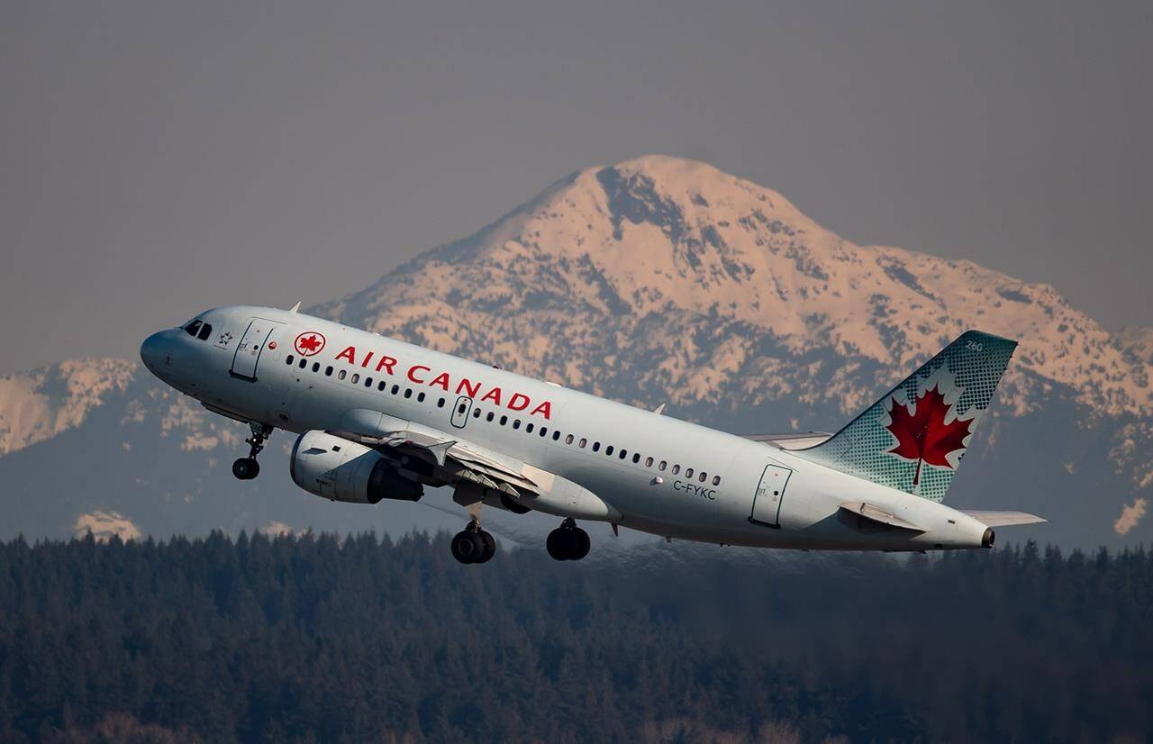 Bell is teaming up with Air Canada to offer free messaging for all Aeroplan members worldwide on Wi-Fi-equipped airplanes across the air carrier’s fleet. An Air Canada flight departing for Calgary takes off at Vancouver International Airport, in Richmond, B.C., on Friday, March 20, 2020. THE CANADIAN PRESS/Darryl Dyck
