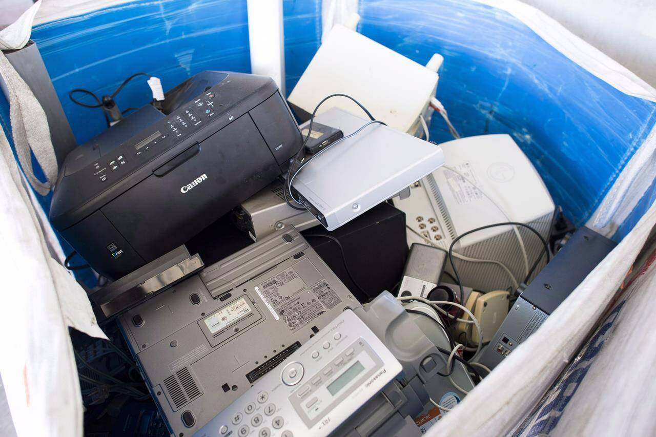 Canada’s electronic waste has more than tripled in the last two decades and is expected to continue rising, researchers have found, prompting calls for better e-waste management to reap its economic benefits and reduce environmental harm. Wires and electronic e-waste is pictured at the North Vancouver, recycle depot, Thursday, Oct. 4, 2018. THE CANADIAN PRESS Jonathan Hayward