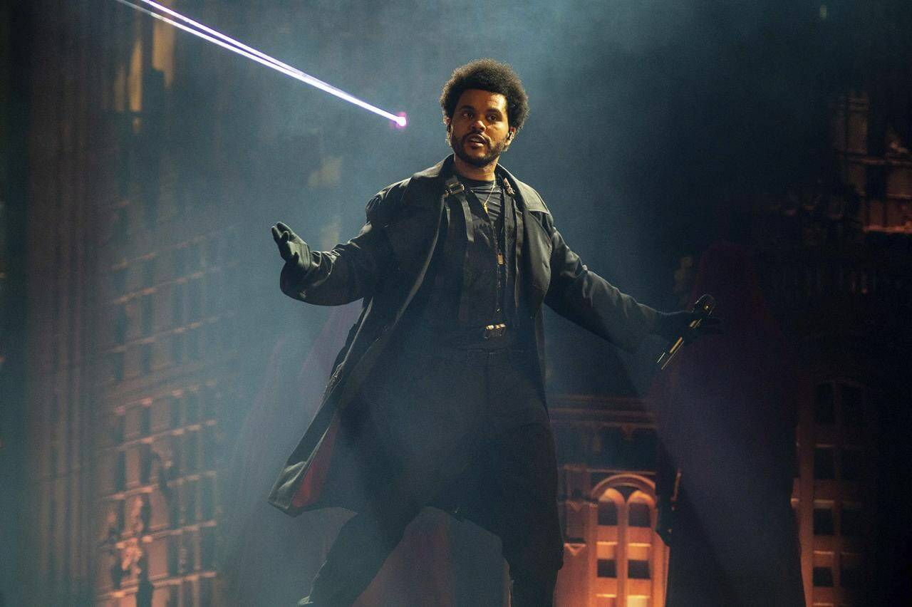 The Weeknd performs during The After Hours Til Dawn Global Stadium Tour at Mercedes-Benz Stadium, in Atlanta, Aug. 11, 2022. The Weekend is the latest celebrity to join the race to purchase the NHL’s Ottawa Senators, according to a report from the Ottawa Sun. THE CANADIAN PRESS/Paul R. Giunta-Invision-AP