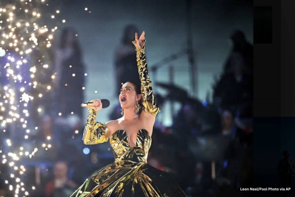 Katy Perry performs during the concert at Windsor Castle in Windsor, England, Sunday, May 7, 2023, celebrating the coronation of King Charles III. It is one of several events over a three-day weekend of celebrations. (Leon Neal/Pool Photo via AP)