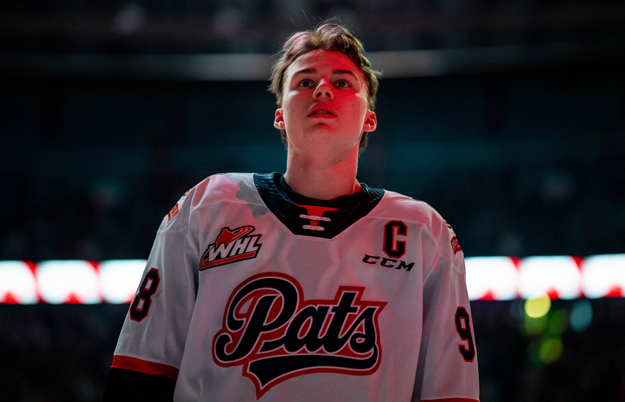 Regina Pats forward Connor Bedard (98) lines up prior to WHL playoff hockey action against the Saskatoon Blades in Saskatoon, Sask., on Friday, March 31, 2023. THE CANADIAN PRESS/Heywood Yu