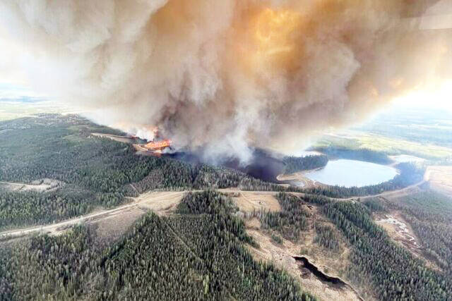 Smoke from an out-of-control fire near Lodgepole, Alta., is shown in this May 4, 2023 handout photo. An out-of-control wildfire has caused thousands of people to flee their homes in Drayton Valley, Alta., and the surrounding rural area. (Photo by Alberta Wildfire /The Canadian Press