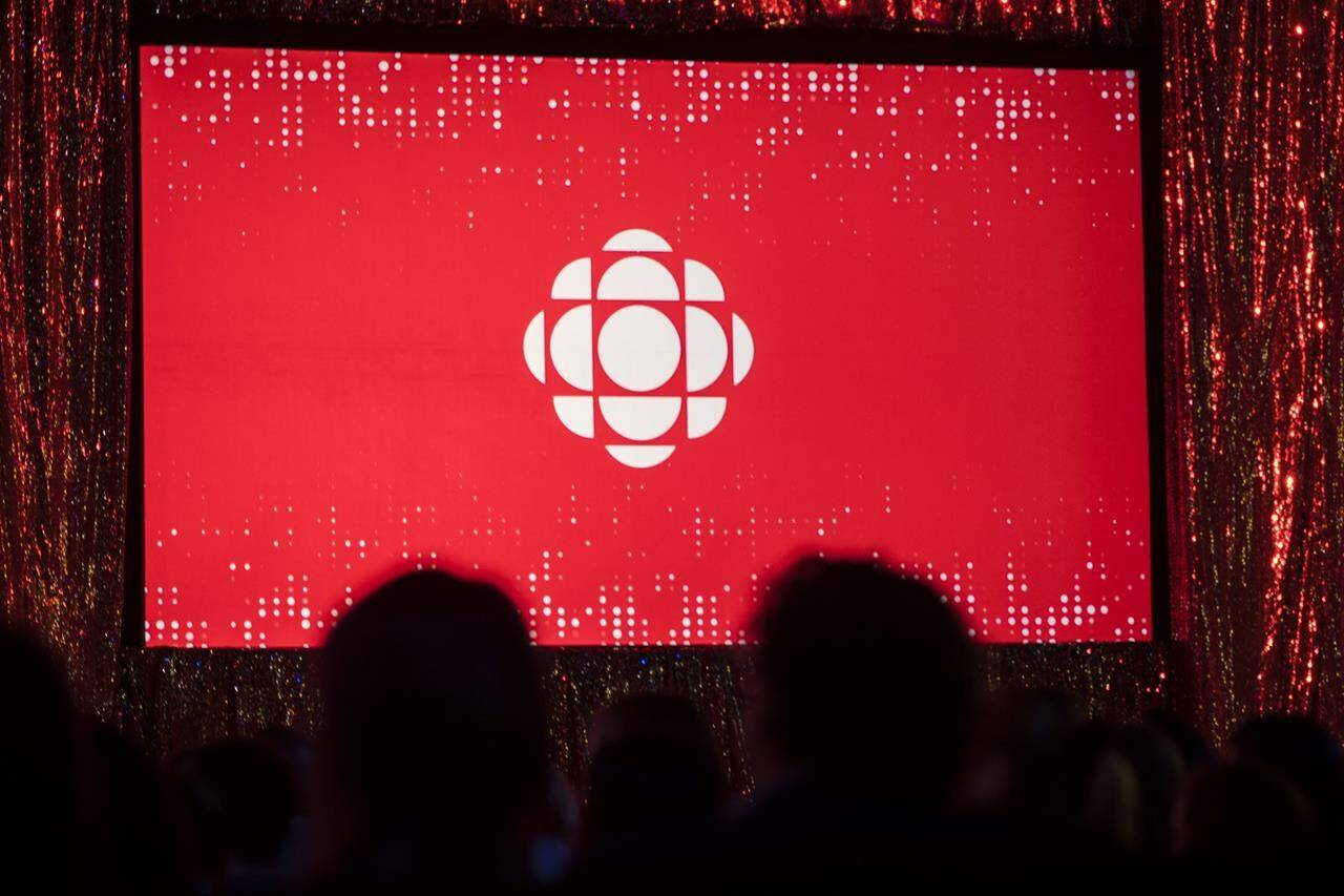 The CBC logo is projected onto a screen in Toronto on May 29, 2019. The CBC and Radio-Canada are returning to Twitter after pausing activity last month over their designation as “government-funded media” by the social media platform. THE CANADIAN PRESS/Tijana Martin