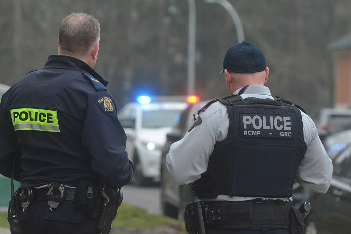 Langley RCMP officers on scene at an emergency event last year. (Langley Advance Times files)