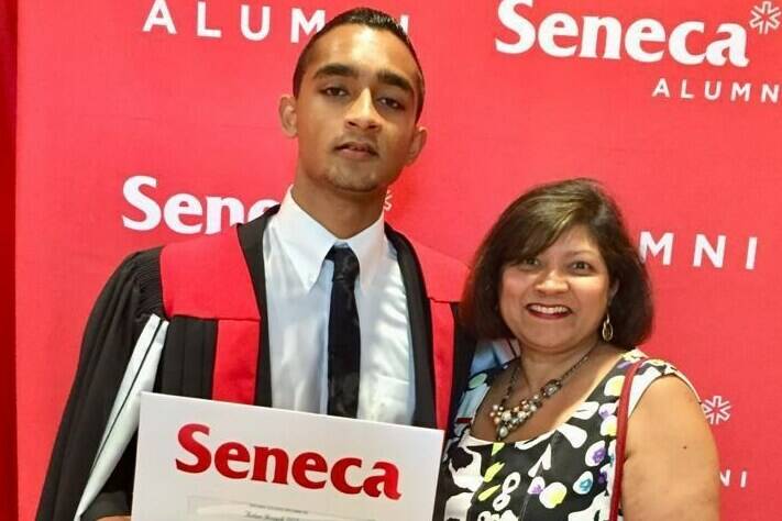 Aidan D’Souza, 23, is pictured with his mother during his Seneca College convocation in a 2019 handout photo. D’Souza says he credits his mother for the financially secure position he’s in today, but acknowledges that not all Canadians have parental figures who are financially literate or know how to best guide their children to make wise financial decisions. THE CANADIAN PRESS/HO-Aidan D’Souza, *MANDATORY CREDIT*