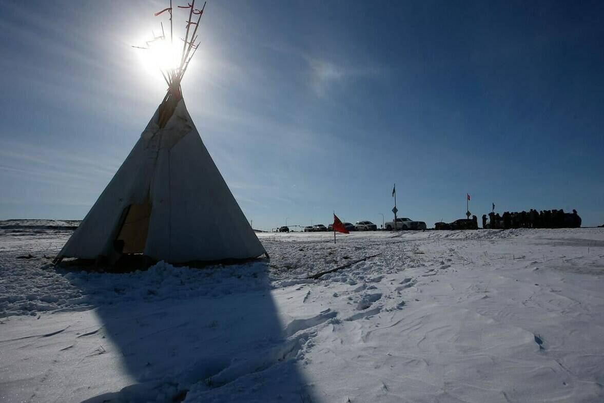 A teepee is shown as Christopher Traverse, Chief of Lake St. Martin First Nation speaks to the media at Winnipeg’s Brady Landfill just outside the city, Thursday, April 6, 2023. THE CANADIAN PRESS/John Woods