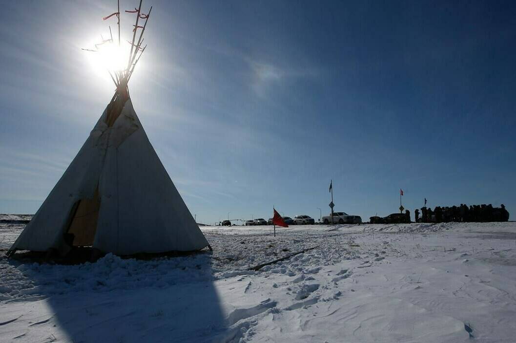 A teepee is shown as Christopher Traverse, Chief of Lake St. Martin First Nation speaks to the media at Winnipeg’s Brady Landfill just outside the city, Thursday, April 6, 2023. THE CANADIAN PRESS/John Woods