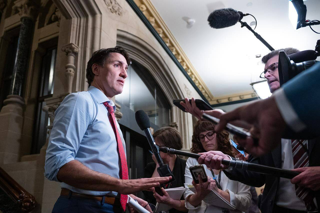 Prime Minister Justin Trudeau speaks to reporters before heading to a caucus meeting on Parliament Hill in Ottawa, on Wednesday, May 10, 2023. THE CANADIAN PRESS/Spencer Colby