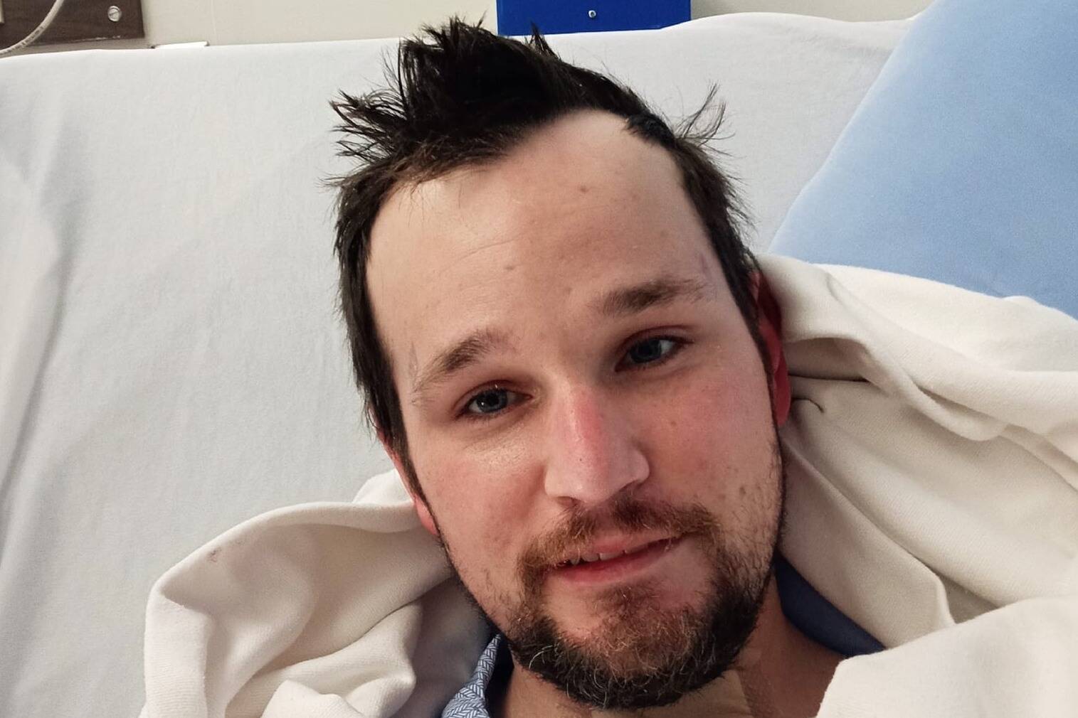 Davin Cochrane is awake, alert, and breathing on his own at Victoria General Hospital after being shot twice in the head by RCMP on March 28. (Courtesy of Sarah Annie Brown)