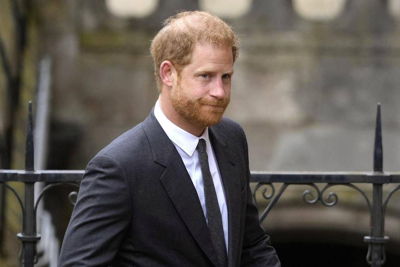 FILE - Britain’s Prince Harry arrives at the Royal Courts Of Justice in London, Thursday, March 30, 2023. A lawyer has asked a London judge to allow Prince Harry to challenge the government’s denial of his request to pay for police protection when he visits the U.K. Attorney Shaheed Fatima said Tuesday, May 16, 2023 that the government had exceeded its authority. (AP Photo/Kirsty Wigglesworth, File)