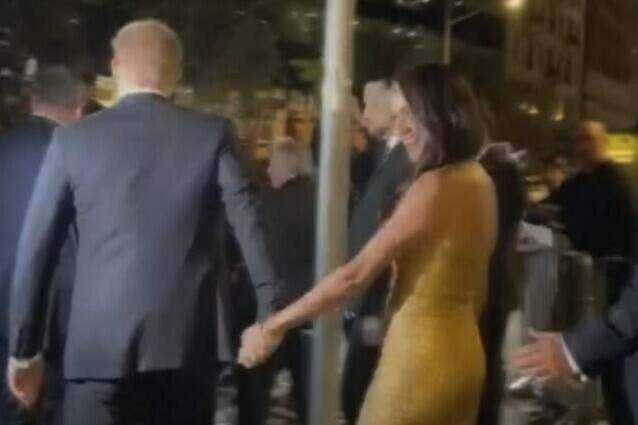 In this image from video, Prince Harry and his wife Meghan Markle exit Manhattan’s Ziegfeld Ballroom on Tuesday, May 16, 2023 in New York. The couple’s office says the pair and Meghan’s mother were followed by vehicles after leaving a charity event on Tuesday. It said in a statement Wednesday that the pursuit “resulted in multiple near collisions involving other drivers on the road, pedestrians and two NYPD officers.” The incident instantly drew comparisons to the 1997 fatal car crash of Harry’s mother, Princess Diana. (AP Photo)