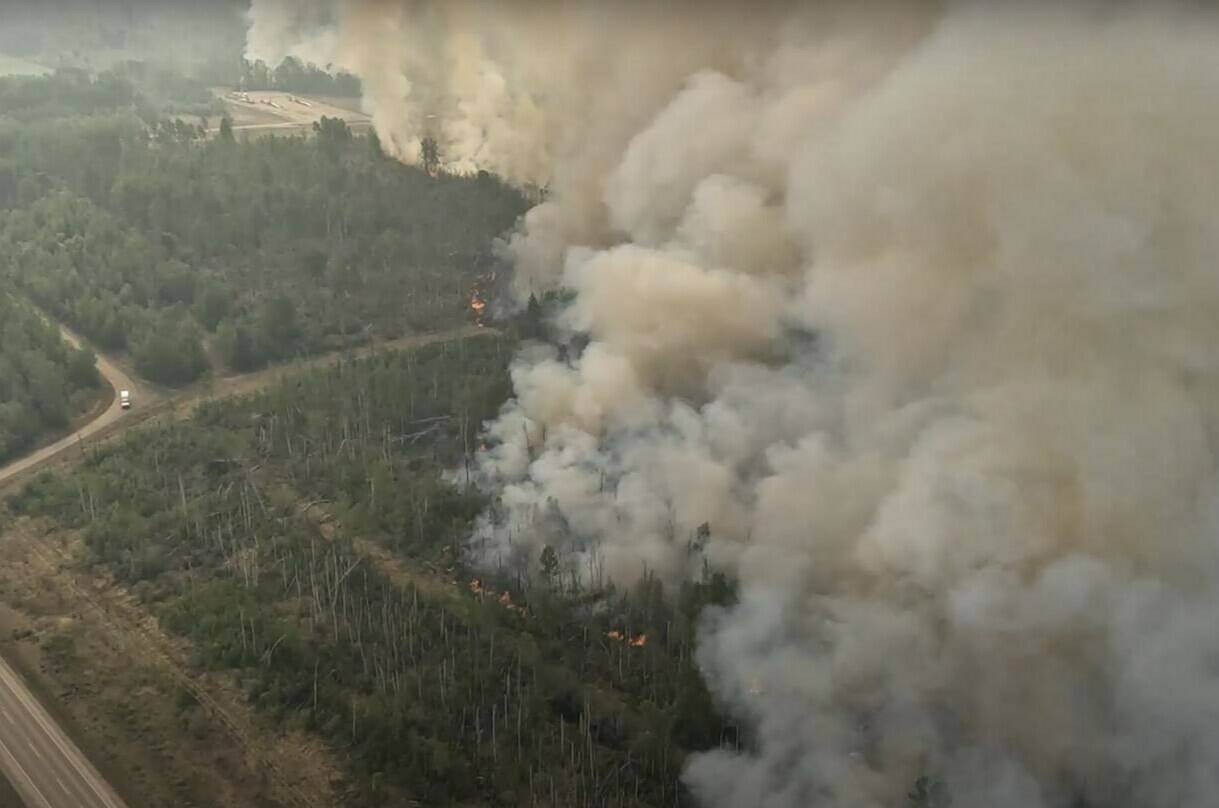 Smoke is shown as the Stoddart Creek wildfire burns in British Columbia in this May 17, 2023 handout image taken from video. THE CANADIAN PRESS/HO-BC Wildfire Service **MANDATORY CREDIT**