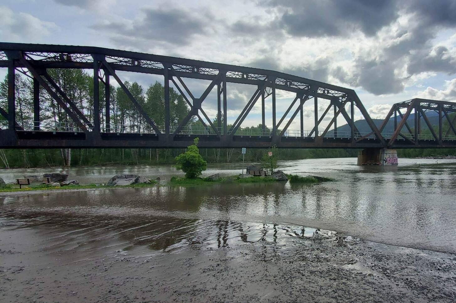 Water levels at the Kalum River Bridge, just east of Terrace, begin to recede on May 21. The B.C. River Forecast Centre downgraded its flood warning to a flood watch for the Skeena Region, including Terrace, as a high-pressure system that brought record-breaking temperatures and flooding to the region dissipates. (Submitted photo)