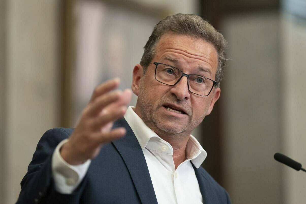 Bloc Québécois Leader Yves-Francois Blanchet is joining Conservative Leader Pierre Poilievre in refusing to take a look at secret information a watchdog used to recommend against a public inquiry into allegations of foreign interference. Blanchet speaks with reporters in the Foyer of the House of Commons, Wednesday, May 24, 2023 in Ottawa. THE CANADIAN PRESS/Adrian Wyld