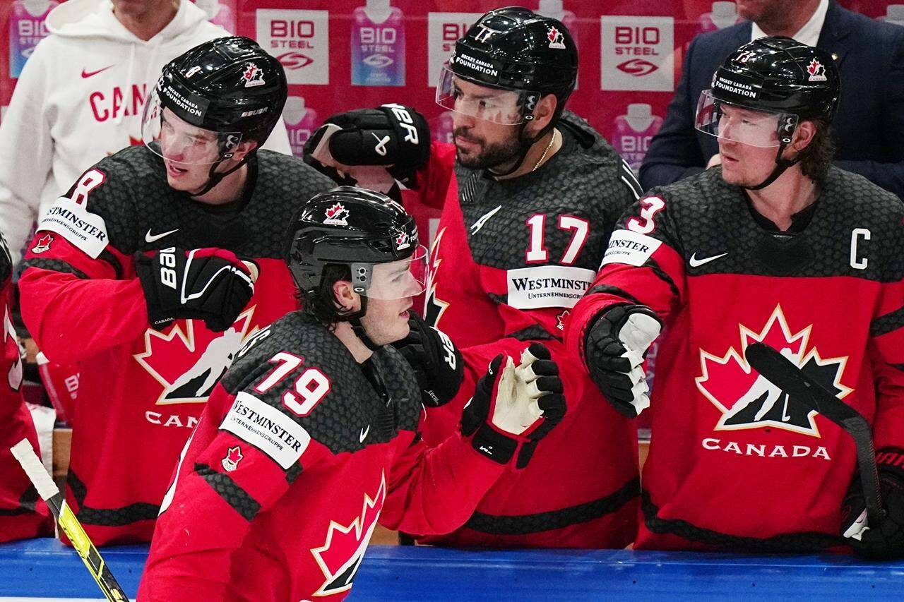 Canada’s Samuel Blais, second from left, celebrates with teammates after scoring his side’s second goal during the quarterfinal match between Canada and Finland at the ice hockey world championship in Tampere, Finland, Thursday, May 25, 2023. THE CANADIAN PRESS/AP, Pavel Golovkin