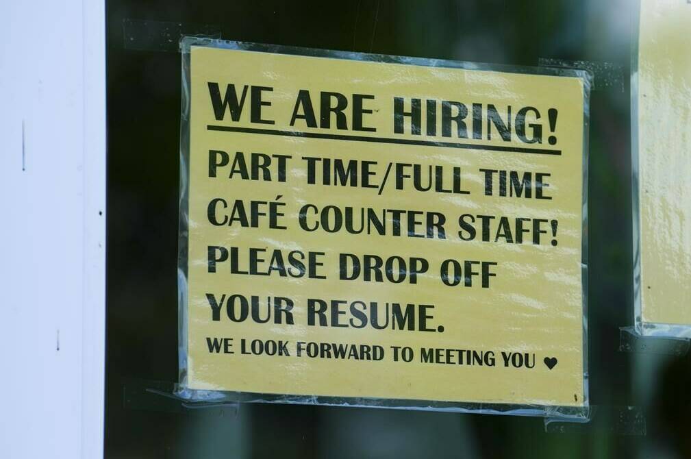 A new report is casting doubt on the idea that Canada is facing a widespread labour shortage, bolstering arguments by labour economists who say the country has more than enough workers. A sign for help wanted is pictured in a business window in Ottawa on Tuesday, July 12, 2022. THE CANADIAN PRESS/Sean Kilpatrick