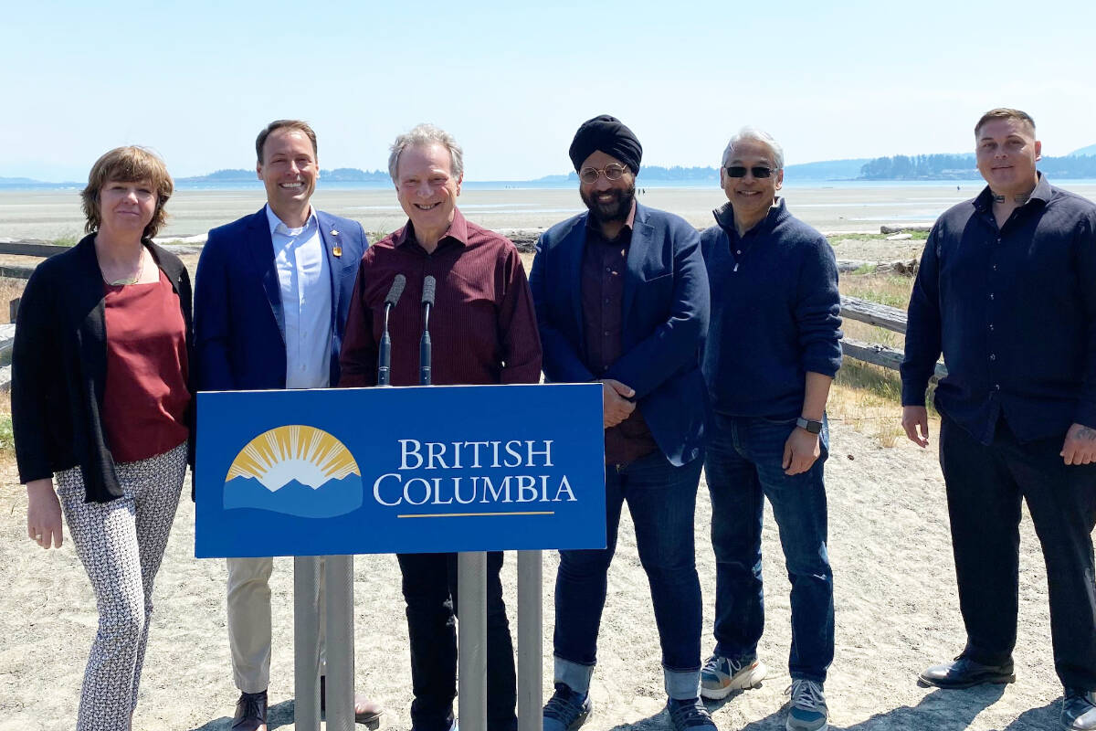 The B.C. government will invest an additional $25 million into its Clean Coast, Clean Waters Initiative Fund. The announcement was made May 30 at Rathtrevor Beach Provincial Park near Parksville. Left to right: Sheila Malcolmson, MLA for Nanaimo Adam Walker, MLA for Parksville-Qualicum, George Heyman, Minister of Environment, MLA Aman Singh, Parliamentary Secretary for Environment, Paul Kariya, Senior Policy Advisor at Coast First Nations-Great Bear Initiative and Joshua Charleson, Relationships Director for the Coastal Restoration Society. (Submitted photo)