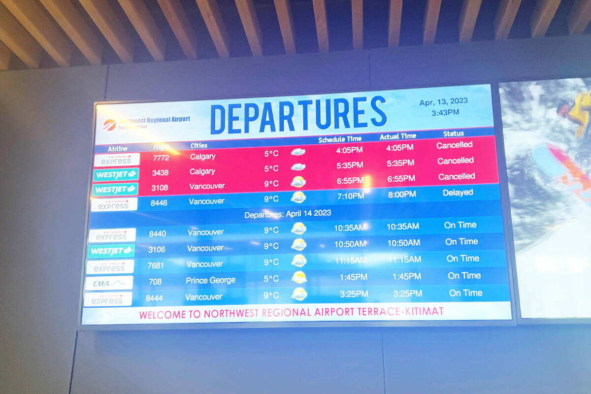 Departure board at Northwest Regional Airport on April 13 at 3:43 p.m. showing cancelled flights due to volcanic ash from an eruption in Russia. (Viktor Elias/Terrace Standard)