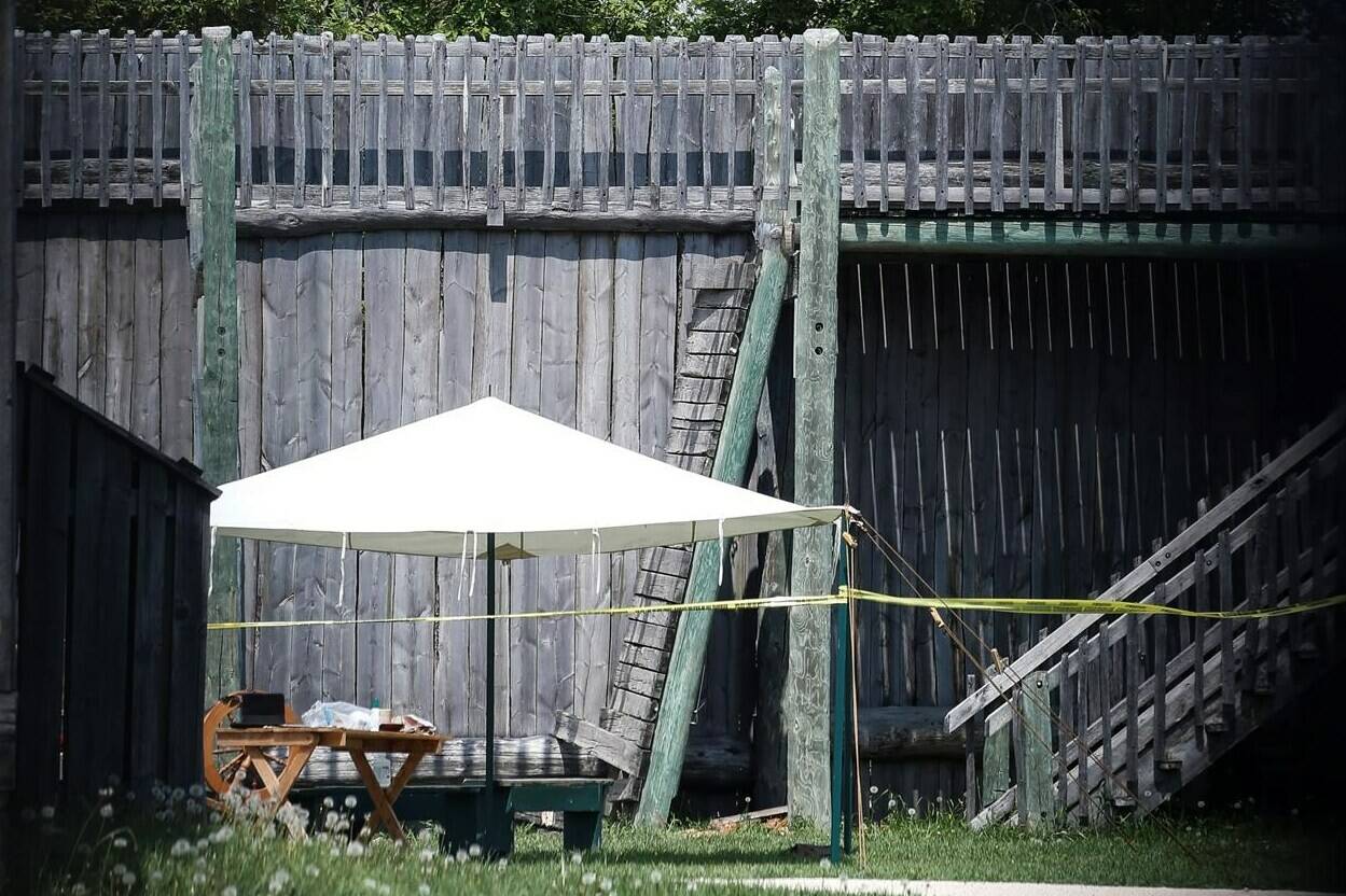A section of collapsed walkway (centre right, behind tent) is shown at Fort Gibraltar in Winnipeg, Wednesday, May 31, 2023. Sixteen schoolchildren and one adult were taken to hospital after a fall Wednesday at the popular tourist attraction. THE CANADIAN PRESS/John Woods
