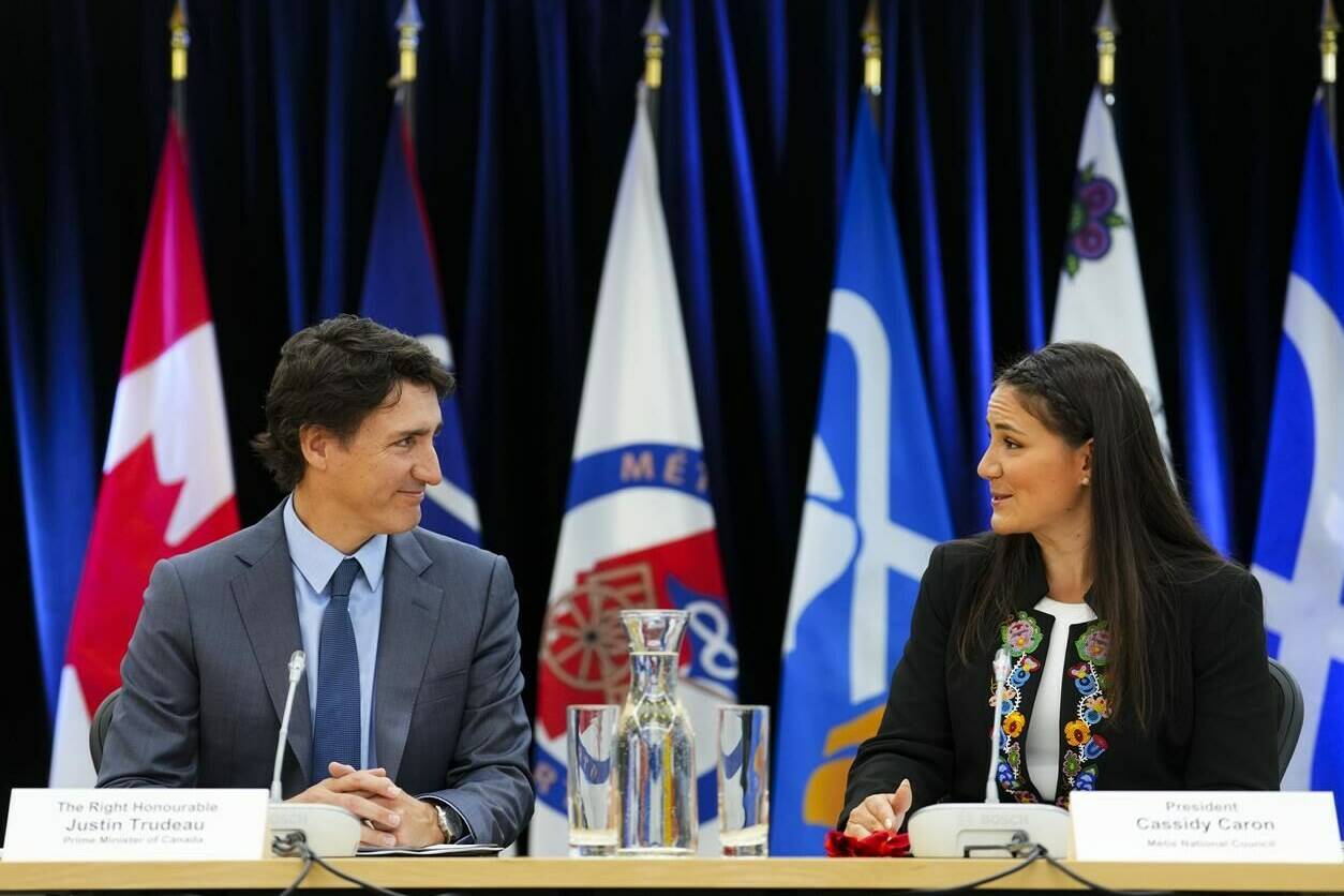 Prime Minister Justin Trudeau and Metis National Council President Cassidy Caron, middle, co-chair a Metis National Council meeting in Ottawa on Thursday, June 1, 2023. THE CANADIAN PRESS/Sean Kilpatrick