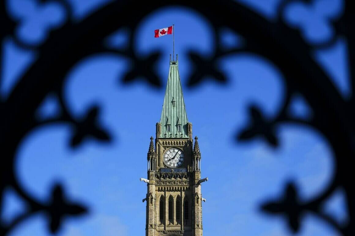 The Canada flag flies atop the Peace Tower on Parliament Hill in Ottawa on Friday, May 5, 2023. THE CANADIAN PRESS/Sean Kilpatrick