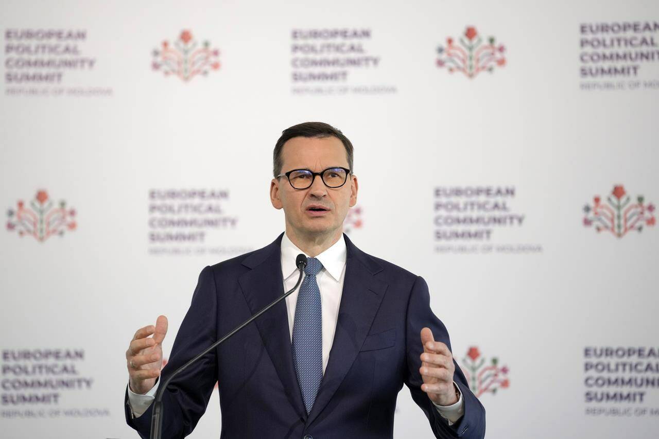 Poland’s Prime Minister Mateusz Morawiecki speaks during a media conference during the European Political Community Summit at the Mimi Castle in Bulboaca, Moldova, Thursday, June 1, 2023. Prime Minister Justin Trudeau is welcoming Morawiecki to Ottawa Friday, June 2, 2023, as Canada increases economic and military ties but keeps quiet on democratic backsliding. THE CANADIAN PRESS/AP-Andreea Alexandru