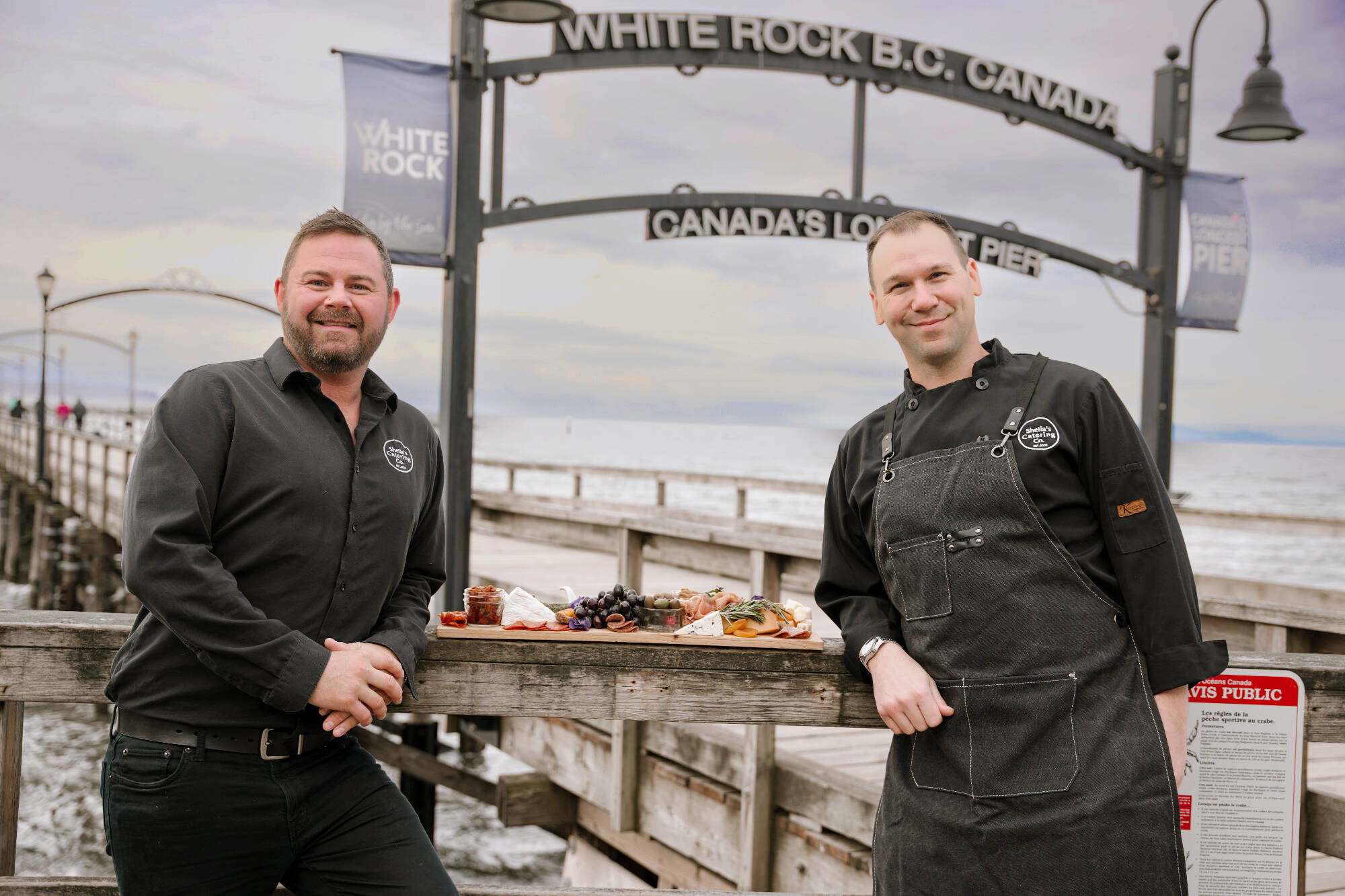 Tickets are now on sale for Charcuterie on the Pier, hosted by Sheila’s Catering owners Brant Darling, left, and Wes Levesque. The fundraising event, scheduled for Sept. 2, 2023, will also attempt to break the Guinness World Record for longest charcuterie board. (contributed photo)