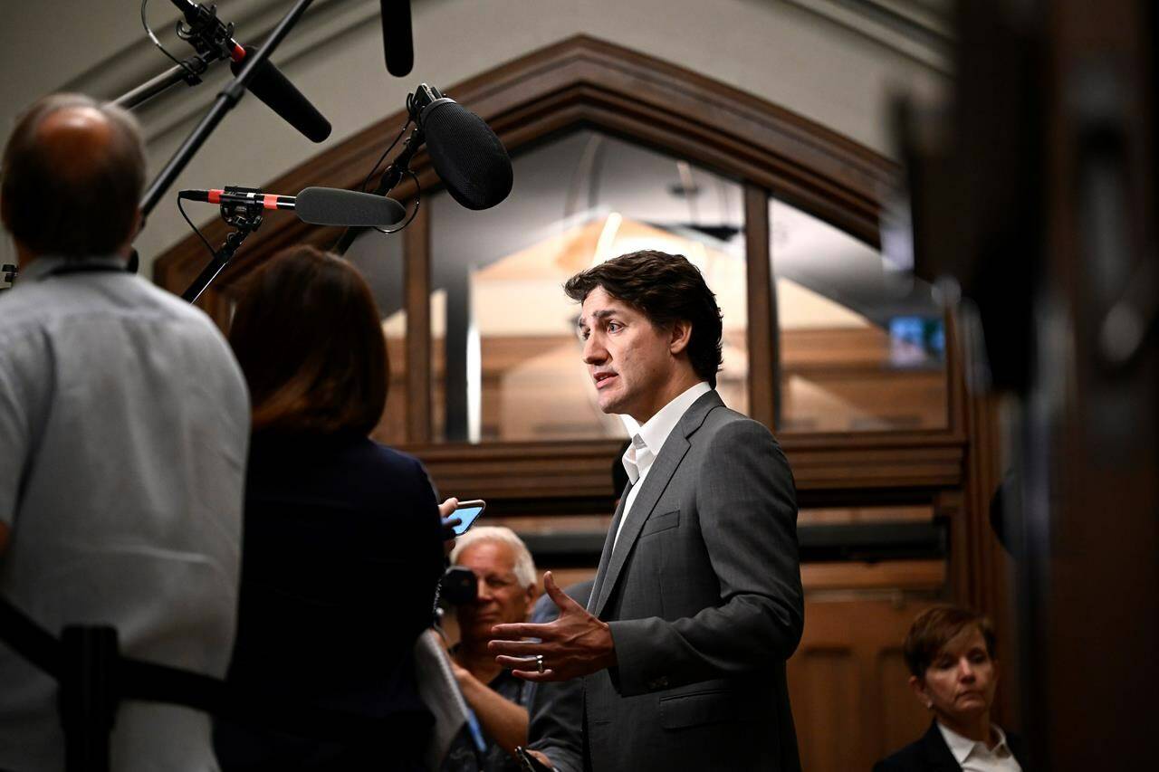 Prime Minister Justin Trudeau speaks to reporters as he arrives for a cabinet meeting on Parliament Hill in Ottawa, on Tuesday, June 6, 2023. THE CANADIAN PRESS/Justin Tang