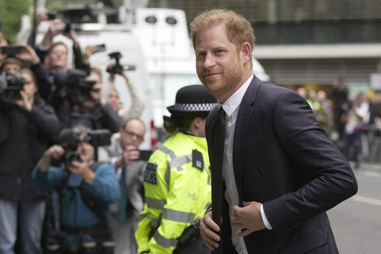 Prince Harry arrives at the High Court in London, Tuesday, June 6, 2023. Prince Harry is due at a London court to testify against a tabloid publisher he accuses of phone hacking and other unlawful snooping. Harry alleges that journalists at the Daily Mirror and its sister papers used unlawful techniques on an “industrial scale” to get scoops. Publisher Mirror Group Newspapers is contesting the claims. (AP Photo/Kin Cheung)