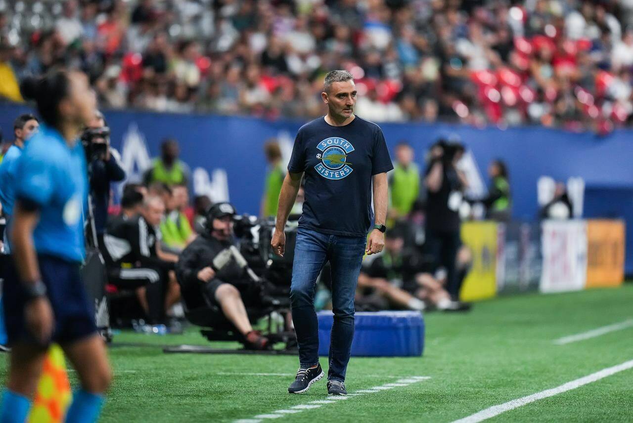 Vancouver Whitecaps head coach Vanni Sartini stands on the sidelines during second half MLS soccer action against Nashville FC in Vancouver on Saturday, August 27, 2022. Sartini says his team needs to respect its opponent and understand that Montreal is a better team than when the two sides first faced off. THE CANADIAN PRESS/Darryl Dyck