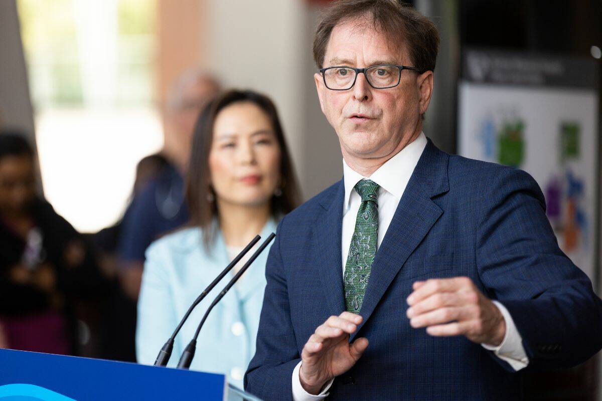 B.C’s Health Minister Adrian Dix, right, and Fraser Health CEO Dr. Victoria Lee at a health care announcement at Surrey Memorial Hospital in Surrey on Wednesday, June 7, 2023. (Photo: Anna Burns)
