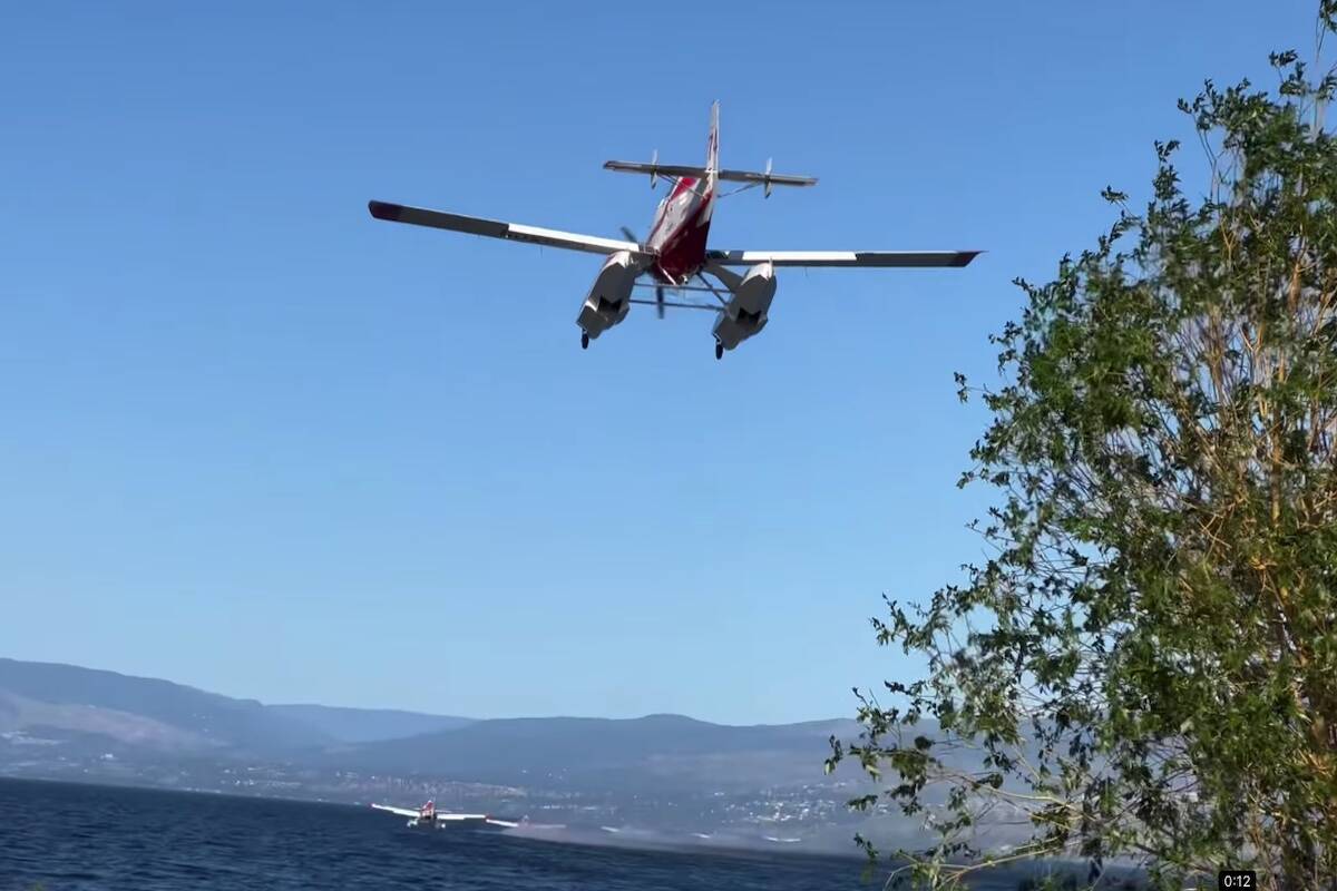 BC Wildfire air skimmers over Okanagan Lake on June 5. (Steve Tidder)