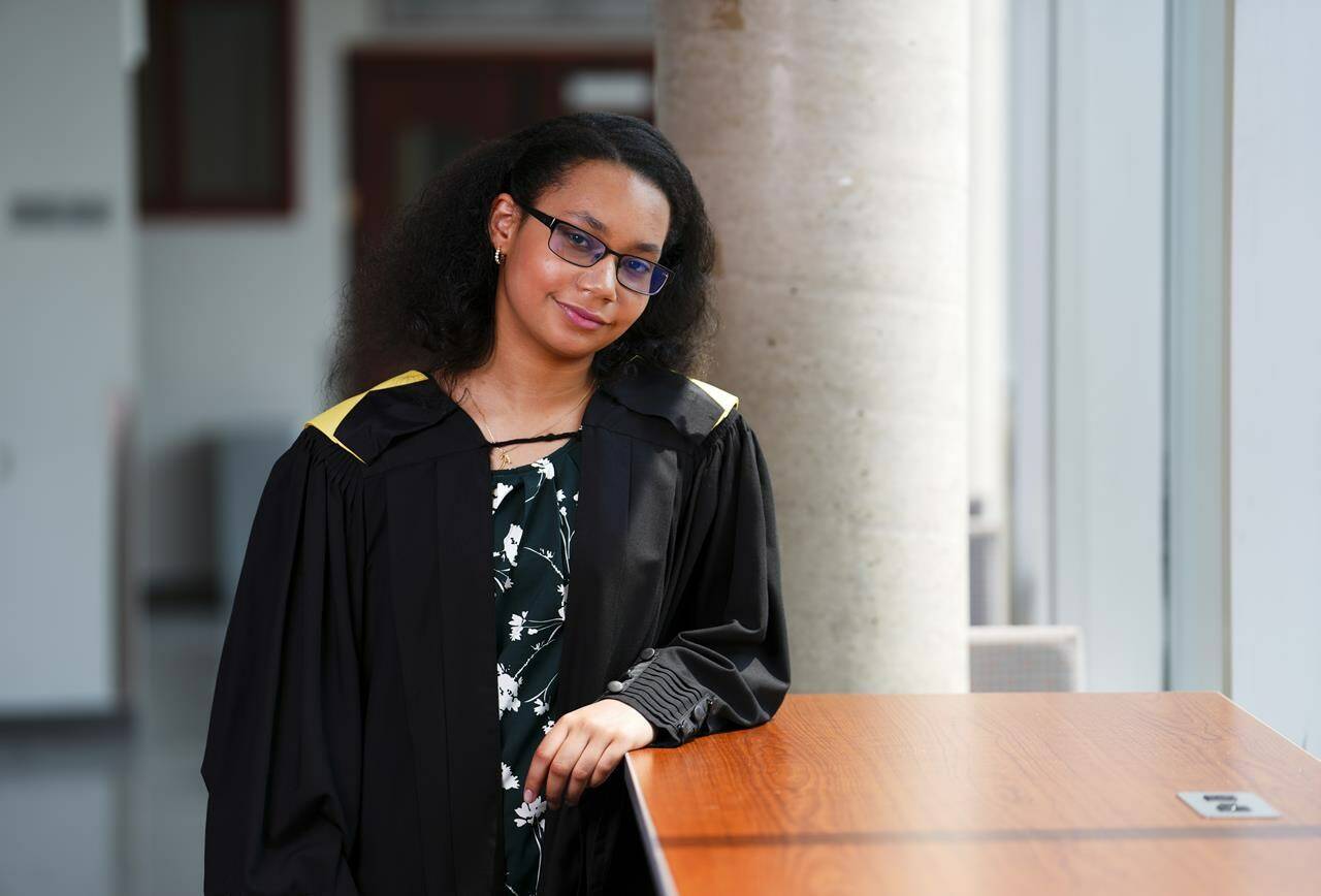 Anthaea-Grace Patricia Dennis poses for a portrait at the University of Ottawa in Ottawa on Friday, June 2, 2023. The 12-year-old is graduating from the University of Ottawa’s biomedical science program, and setting a record in the process. THE CANADIAN PRESS/Sean Kilpatrick